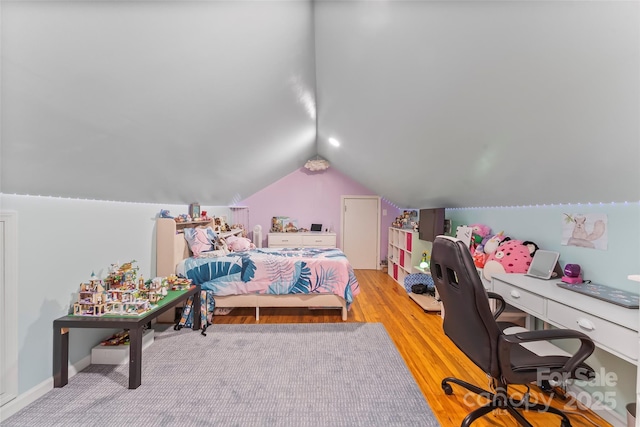 1072 5th St NE, Hickory, NC 28601 - bedroom with lofted ceiling, a desk, and light wood-type flooring
