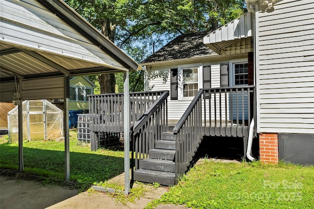 1072 5th St NE, Hickory, NC 28601 - view of exterior entry featuring a wooden deck and a lawn