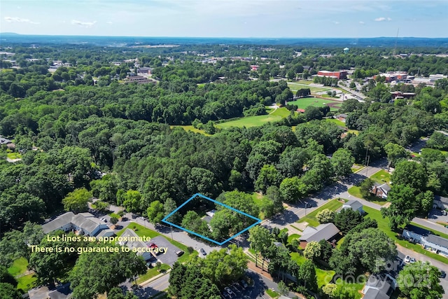 1072 5th St NE, Hickory, NC 28601 - aerial view of property's location featuring property parcel outlined and a forest