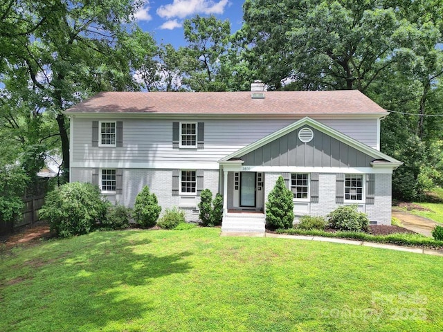 3800 Lovett Cir, Charlotte, NC 28210 - view of front of home featuring brick siding and a chimney