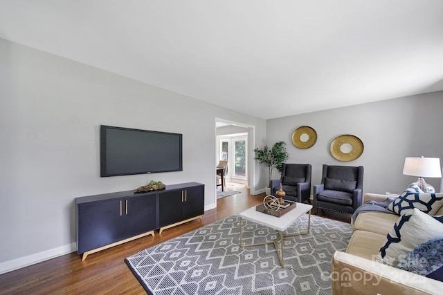 3800 Lovett Cir, Charlotte, NC 28210 - living room featuring baseboards and wood finished floors