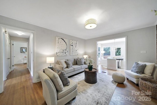 3800 Lovett Cir, Charlotte, NC 28210 - living area featuring wood finished floors and crown molding