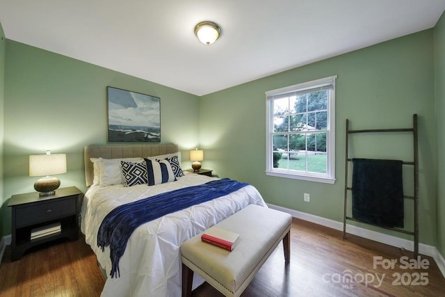 3800 Lovett Cir, Charlotte, NC 28210 - bedroom featuring baseboards and wood finished floors