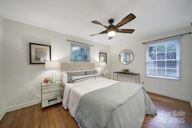 3800 Lovett Cir, Charlotte, NC 28210 - bedroom with wood finished floors, multiple windows, and a ceiling fan