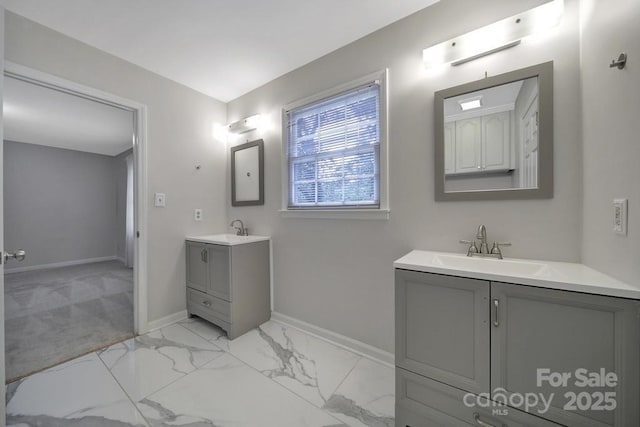 3800 Lovett Cir, Charlotte, NC 28210 - full bathroom featuring two vanities and marble look tile flooring