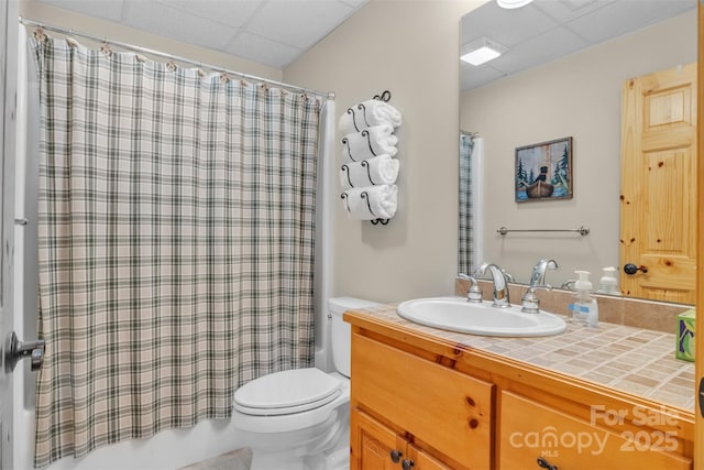 265 Laurel Mountain Estates Dr, Todd, NC 28684 - bathroom with vanity, a drop ceiling, toilet, and shower / bathtub combination with curtain