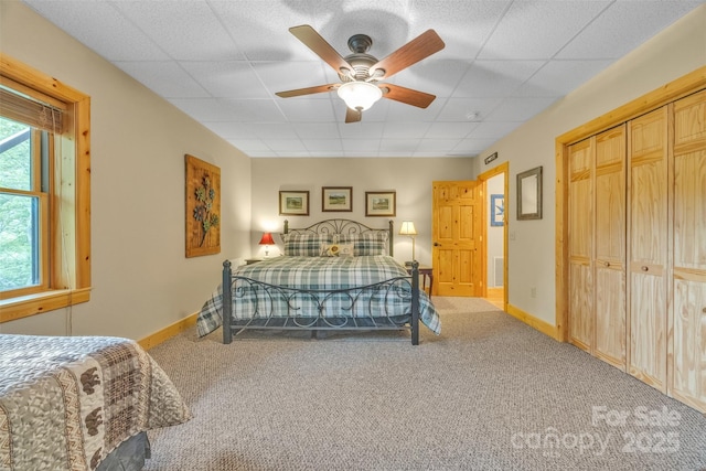 265 Laurel Mountain Estates Dr, Todd, NC 28684 - carpeted bedroom with a paneled ceiling, baseboards, a closet, and ceiling fan