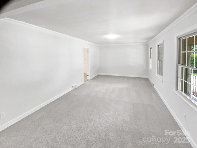302 Melinda Ave, Kannapolis, NC 28083 - spare room with carpet, ornamental molding, and baseboards