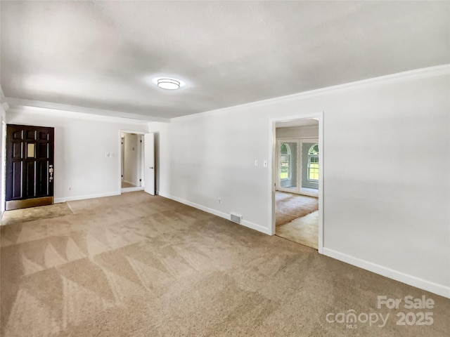 302 Melinda Ave, Kannapolis, NC 28083 - spare room featuring carpet, baseboards, and ornamental molding