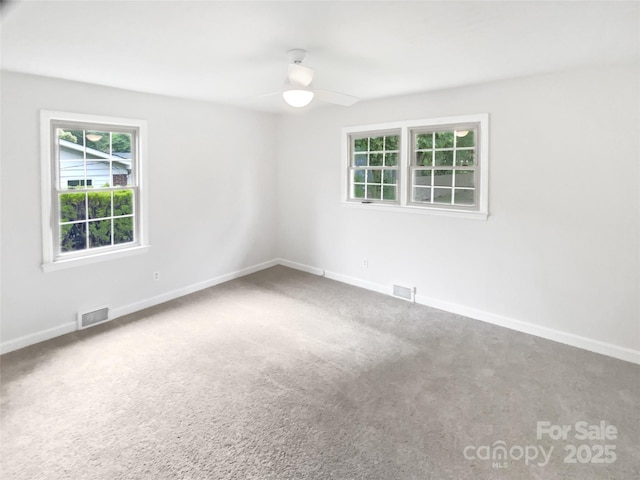 302 Melinda Ave, Kannapolis, NC 28083 - unfurnished room featuring carpet, ceiling fan, and baseboards