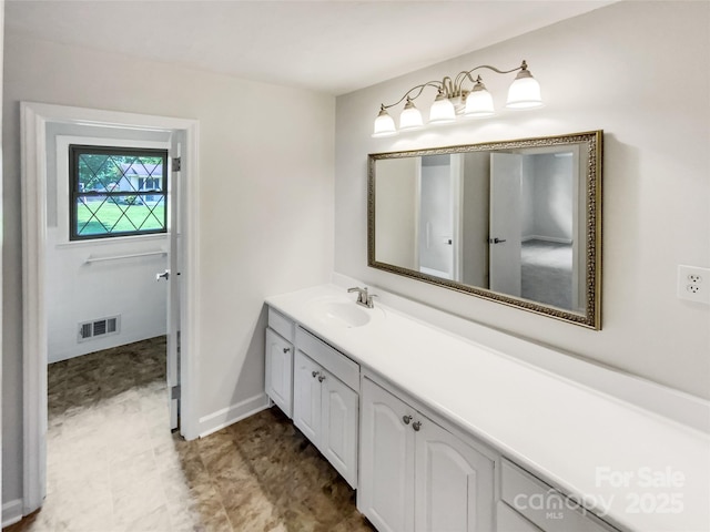 302 Melinda Ave, Kannapolis, NC 28083 - bathroom featuring vanity and baseboards