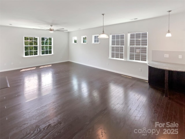 1680 Trentwood Dr, Fort Mill, SC 29715 - unfurnished living room with ceiling fan, baseboards, and dark wood-style floors