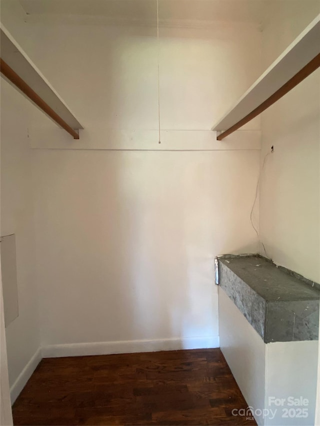 1300 Montgomery Ave, Albemarle, NC 28001 - walk in closet featuring wood finished floors
