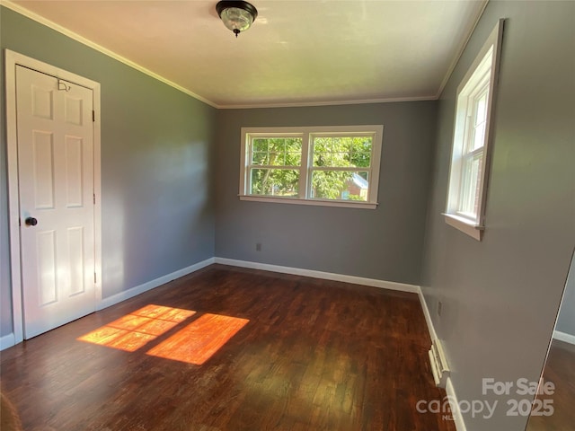 1300 Montgomery Ave, Albemarle, NC 28001 - empty room featuring wood finished floors and crown molding