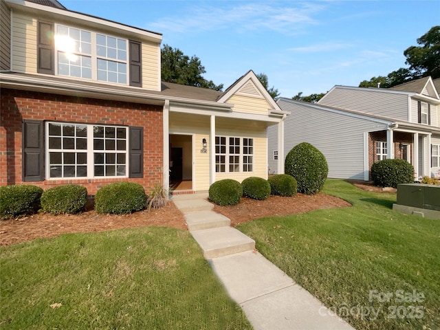 1573 Maypine Commons Way, Rock Hill, SC 29732 - traditional home with brick siding and a front yard