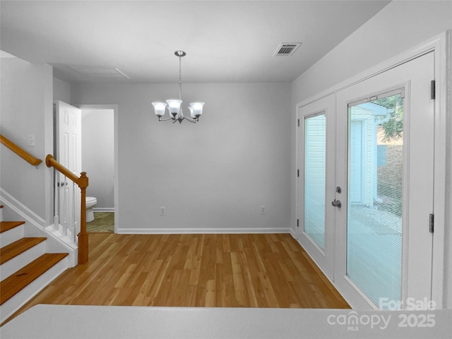1573 Maypine Commons Way, Rock Hill, SC 29732 - unfurnished dining area with light wood-style floors, a chandelier, and baseboards