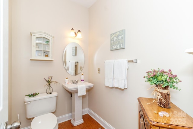1006 Apogee Dr, Indian Trail, NC 28079 - half bath with toilet and wood finished floors
