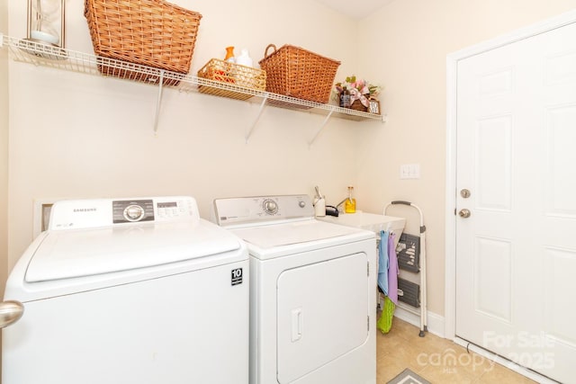 1006 Apogee Dr, Indian Trail, NC 28079 - laundry area with independent washer and dryer and light tile patterned flooring