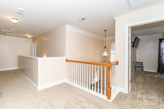 1006 Apogee Dr, Indian Trail, NC 28079 - corridor featuring carpet flooring, an upstairs landing, and crown molding