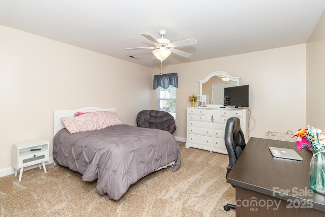 1006 Apogee Dr, Indian Trail, NC 28079 - bedroom featuring light colored carpet and a ceiling fan