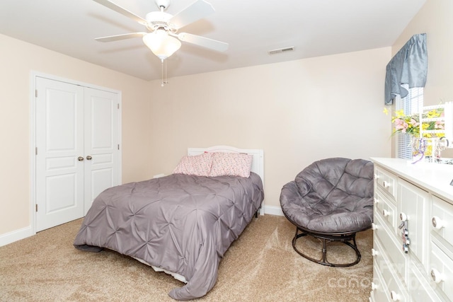 1006 Apogee Dr, Indian Trail, NC 28079 - bedroom featuring light colored carpet, a ceiling fan, and a closet