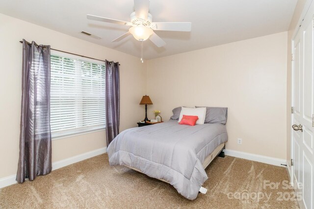 1006 Apogee Dr, Indian Trail, NC 28079 - bedroom with carpet floors and a ceiling fan