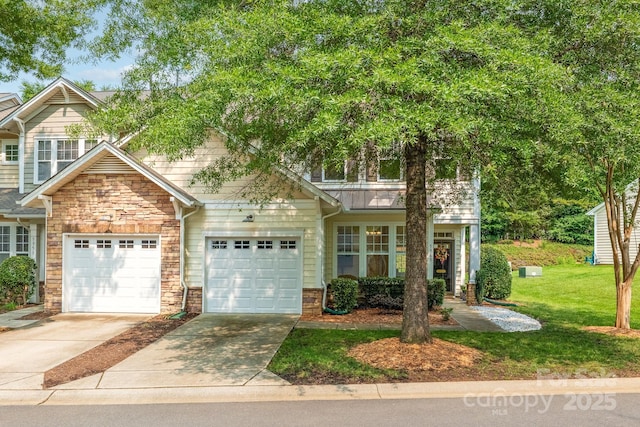 5963 Pale Moss Ln, Charlotte, NC 28269 - view of front facade with driveway, stone siding, a front lawn, and a garage
