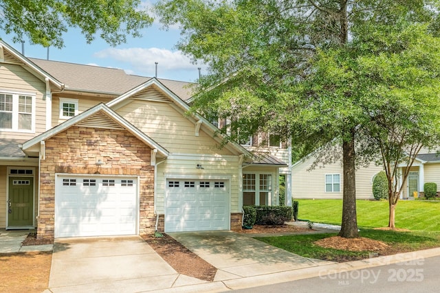 5963 Pale Moss Ln, Charlotte, NC 28269 - view of front facade with driveway, stone siding, an attached garage, and a front lawn