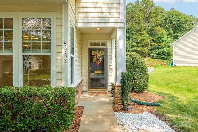 5963 Pale Moss Ln, Charlotte, NC 28269 - doorway to property with a yard
