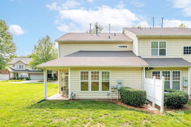 5963 Pale Moss Ln, Charlotte, NC 28269 - back of house with a lawn and roof with shingles