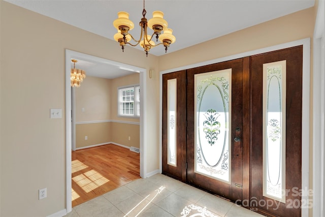 2326 Horseshoe Bend Rd NE, Hickory, NC 28601 - entryway with a chandelier and light tile patterned floors