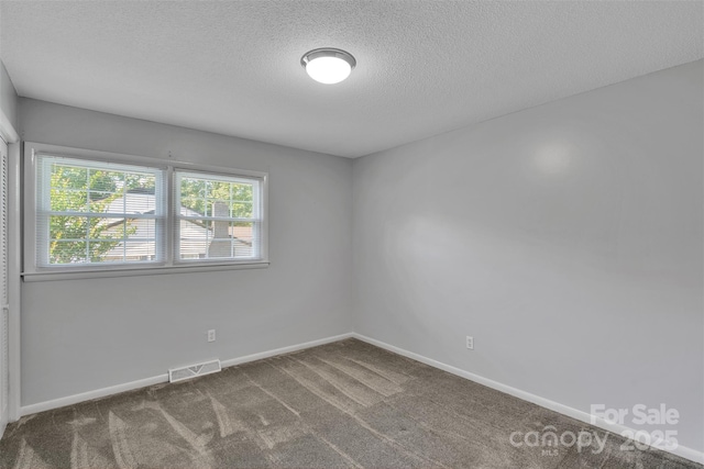 2326 Horseshoe Bend Rd NE, Hickory, NC 28601 - unfurnished room featuring carpet flooring and a textured ceiling