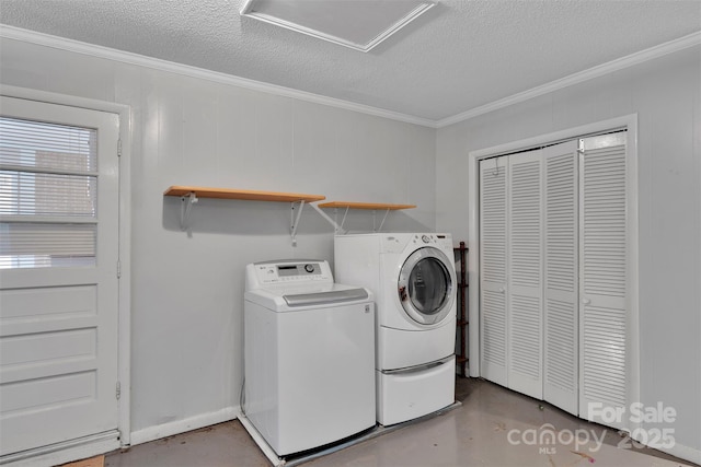 2326 Horseshoe Bend Rd NE, Hickory, NC 28601 - laundry area with washing machine and clothes dryer, crown molding, a textured ceiling, and attic access