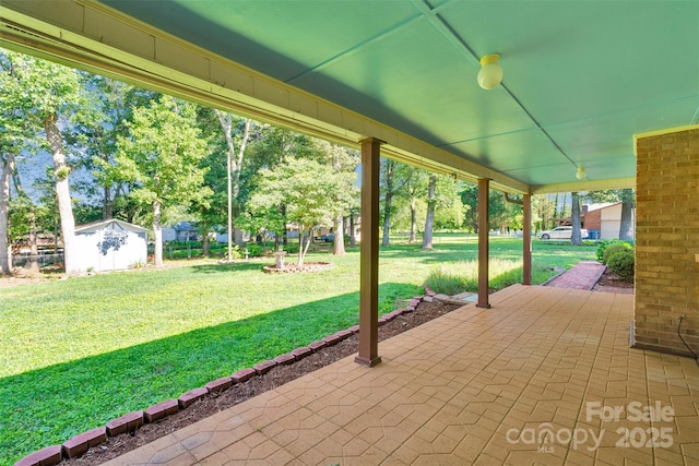 2326 Horseshoe Bend Rd NE, Hickory, NC 28601 - view of patio with a storage unit