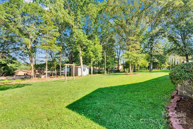 2326 Horseshoe Bend Rd NE, Hickory, NC 28601 - view of yard with a storage shed