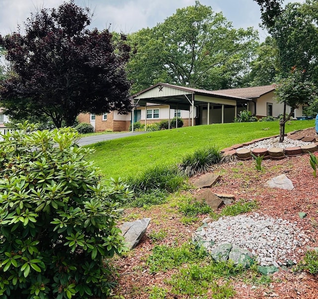 2326 Horseshoe Bend Rd NE, Hickory, NC 28601 - view of green lawn featuring a carport