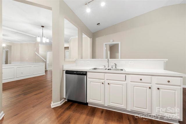 4510 Glenlea Commons Dr, Charlotte, NC 28216 - kitchen featuring dishwasher, vaulted ceiling, a sink, rail lighting, and white cabinets