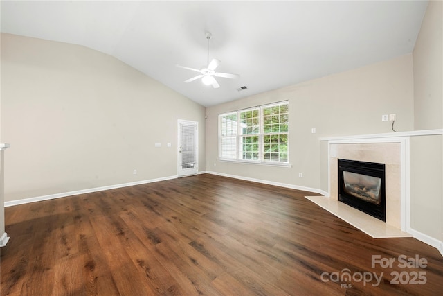 4510 Glenlea Commons Dr, Charlotte, NC 28216 - unfurnished living room with lofted ceiling, a ceiling fan, a fireplace, wood finished floors, and baseboards