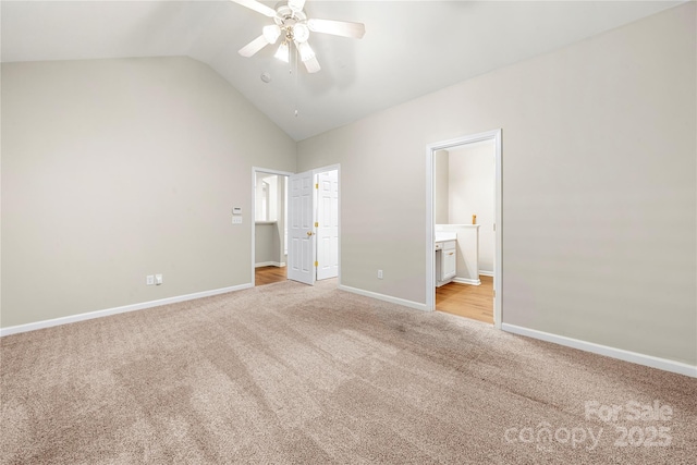 4510 Glenlea Commons Dr, Charlotte, NC 28216 - unfurnished bedroom with carpet, baseboards, ensuite bath, and high vaulted ceiling