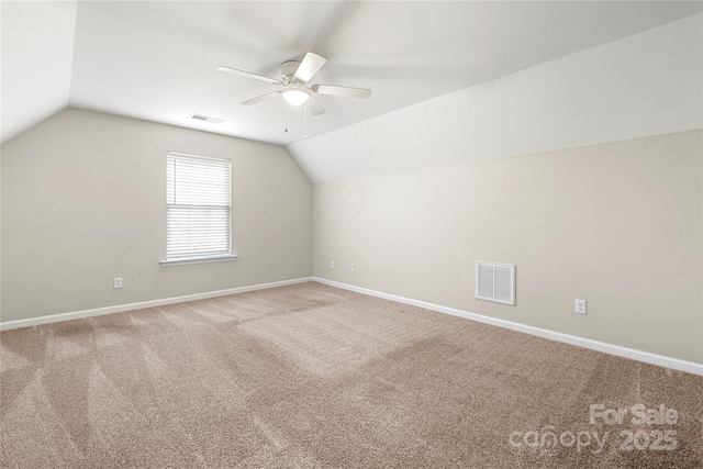 4510 Glenlea Commons Dr, Charlotte, NC 28216 - bonus room with a ceiling fan, carpet flooring, lofted ceiling, and baseboards
