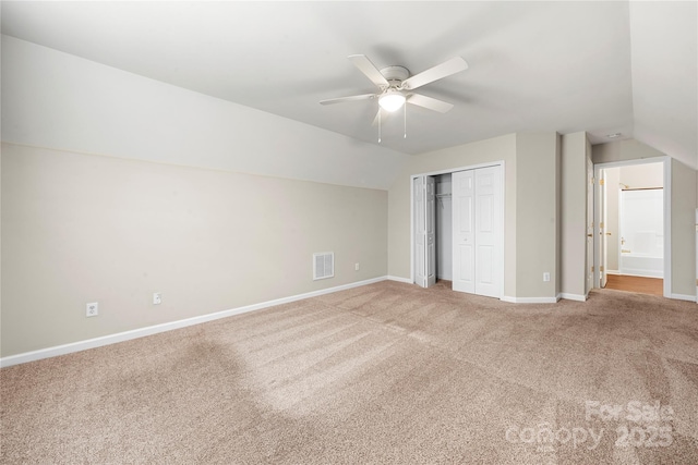 4510 Glenlea Commons Dr, Charlotte, NC 28216 - unfurnished bedroom with carpet flooring, lofted ceiling, baseboards, a closet, and ceiling fan