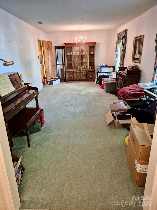 8616 Fallsdale Dr, Charlotte, NC 28214 - carpeted living area with a chandelier
