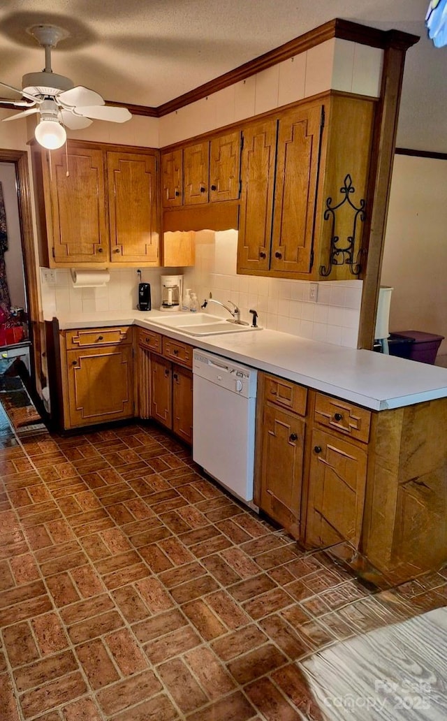 8616 Fallsdale Dr, Charlotte, NC 28214 - kitchen with dishwasher, brown cabinets, brick patterned floors, ornamental molding, and a ceiling fan