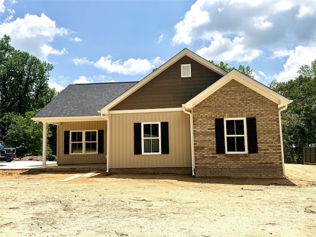 102 Lakeside Dr, Grover, NC 28073 - view of front of home with brick siding and roof with shingles