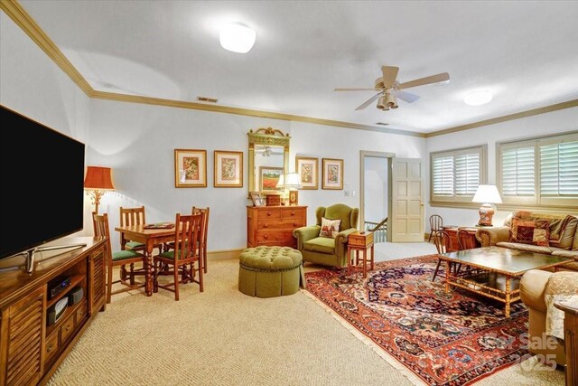 517 Kingsdown Ct, Waxhaw, NC 28173 - living area featuring light carpet, a ceiling fan, and ornamental molding