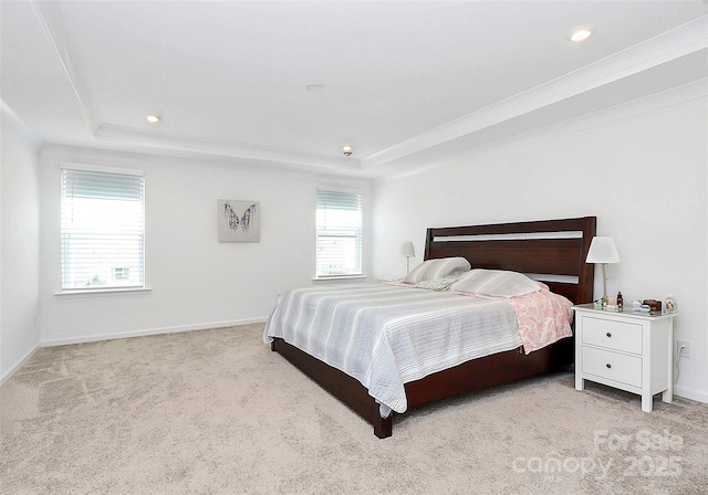 13140 Sudwick Ln, Charlotte, NC 28278 - carpeted bedroom featuring a tray ceiling, baseboards, recessed lighting, and ornamental molding