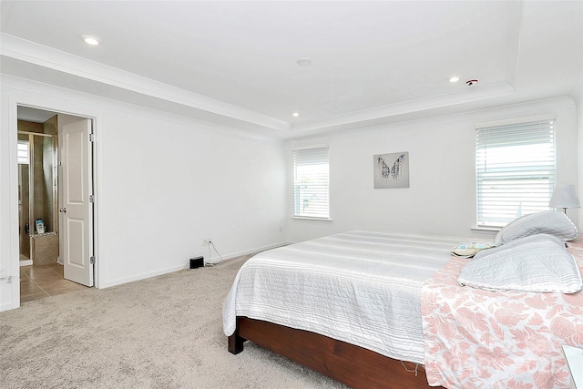 13140 Sudwick Ln, Charlotte, NC 28278 - carpeted bedroom featuring a tray ceiling, recessed lighting, baseboards, and crown molding