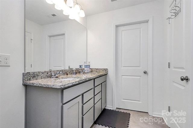13140 Sudwick Ln, Charlotte, NC 28278 - bathroom with double vanity and baseboards