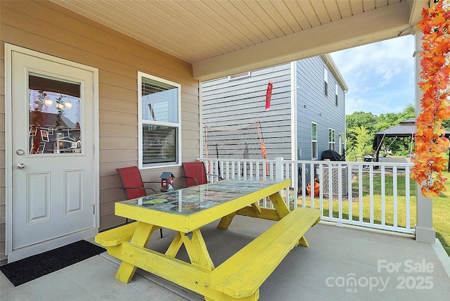 13140 Sudwick Ln, Charlotte, NC 28278 - view of patio / terrace with outdoor dining area and a gazebo