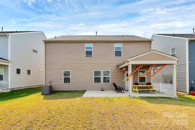 13140 Sudwick Ln, Charlotte, NC 28278 - rear view of house featuring a patio area, a yard, and cooling unit